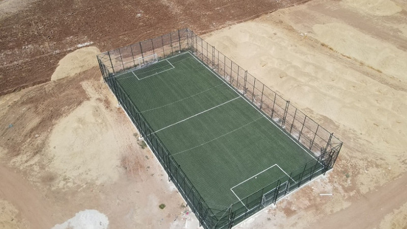 Haliliye'nin 15 Kırsal Mahallesinde Sentetik Semt Sahası Yapımı Başlatıldı